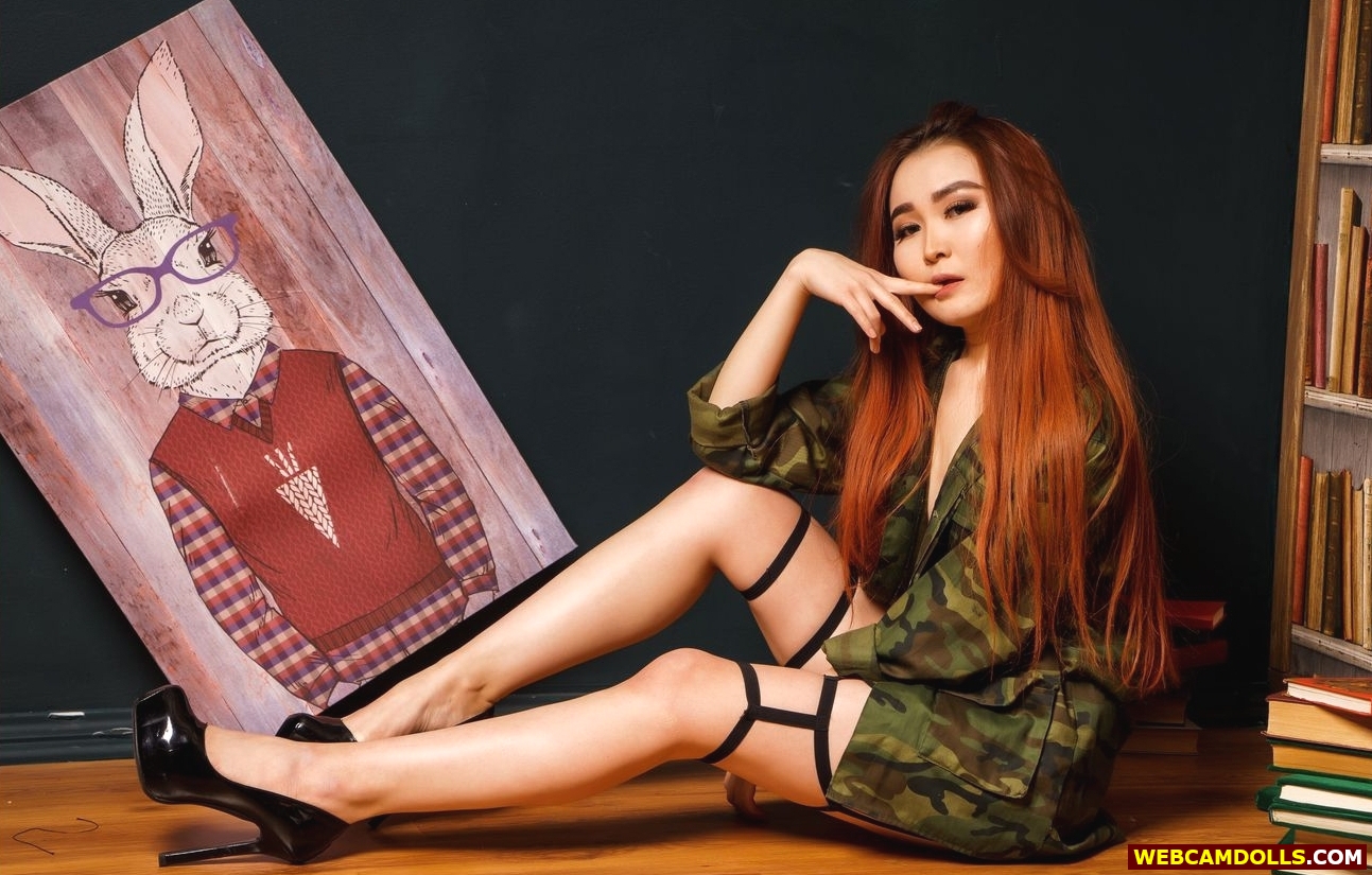 Redhead Asian Girl in Khaki Shirt and Black High Heels on Webcamdolls