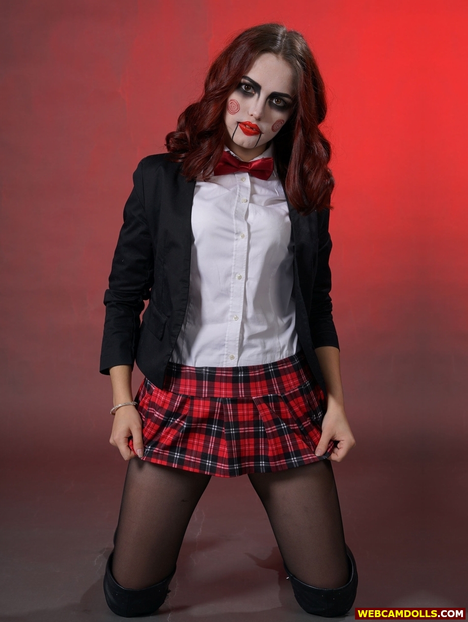 Gothic Schoolgirl kneeling in Tartan Miniskirt and Black Sheer Tights on Webcamdolls