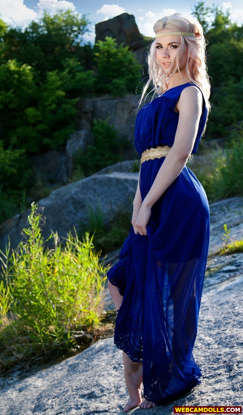 Blonde Girl in Blue Long Dress with Bare Feet on Webcamdolls