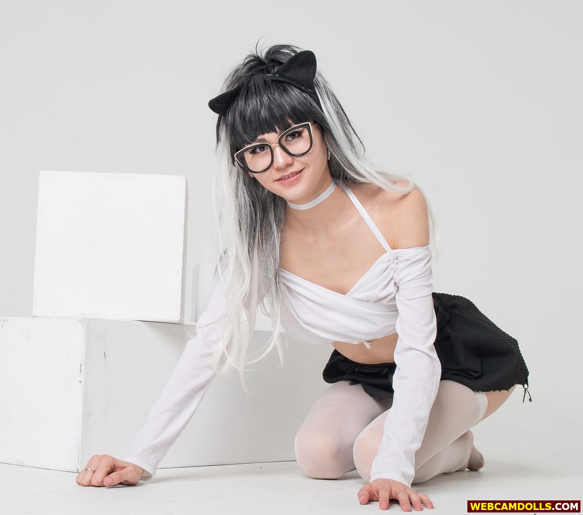 Teen Girl in White Shirt and Sheer Stockings on Webcamdolls