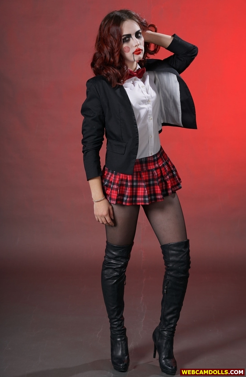 Gothic Schoolgirl in Black Leather Kneehigh Boots and Miniskirt on Webcamdolls