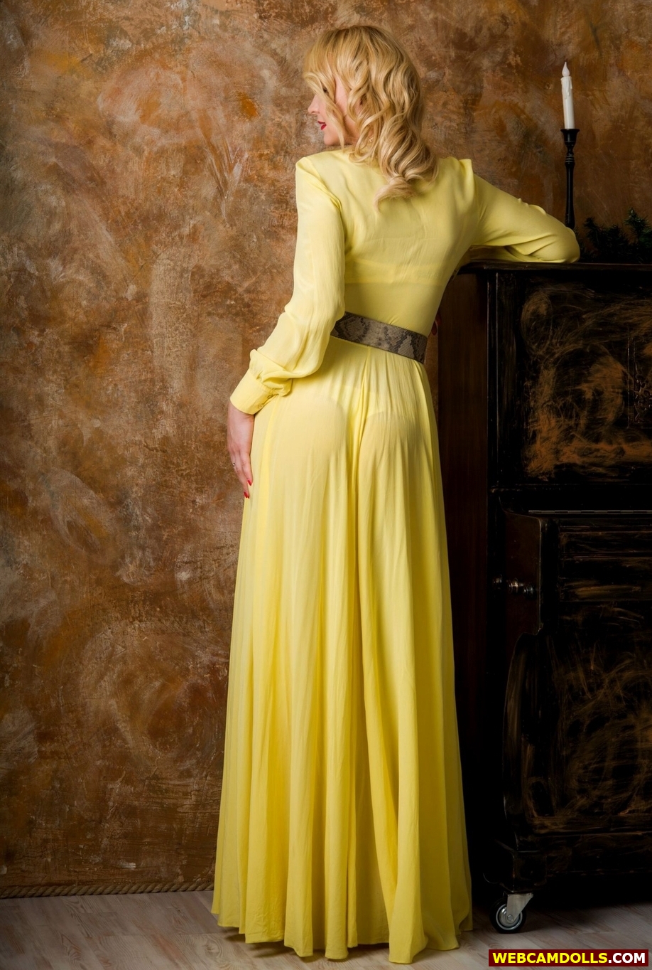 Blonde MILF showing Butt Through Yellow Long Dress on Webcamdolls