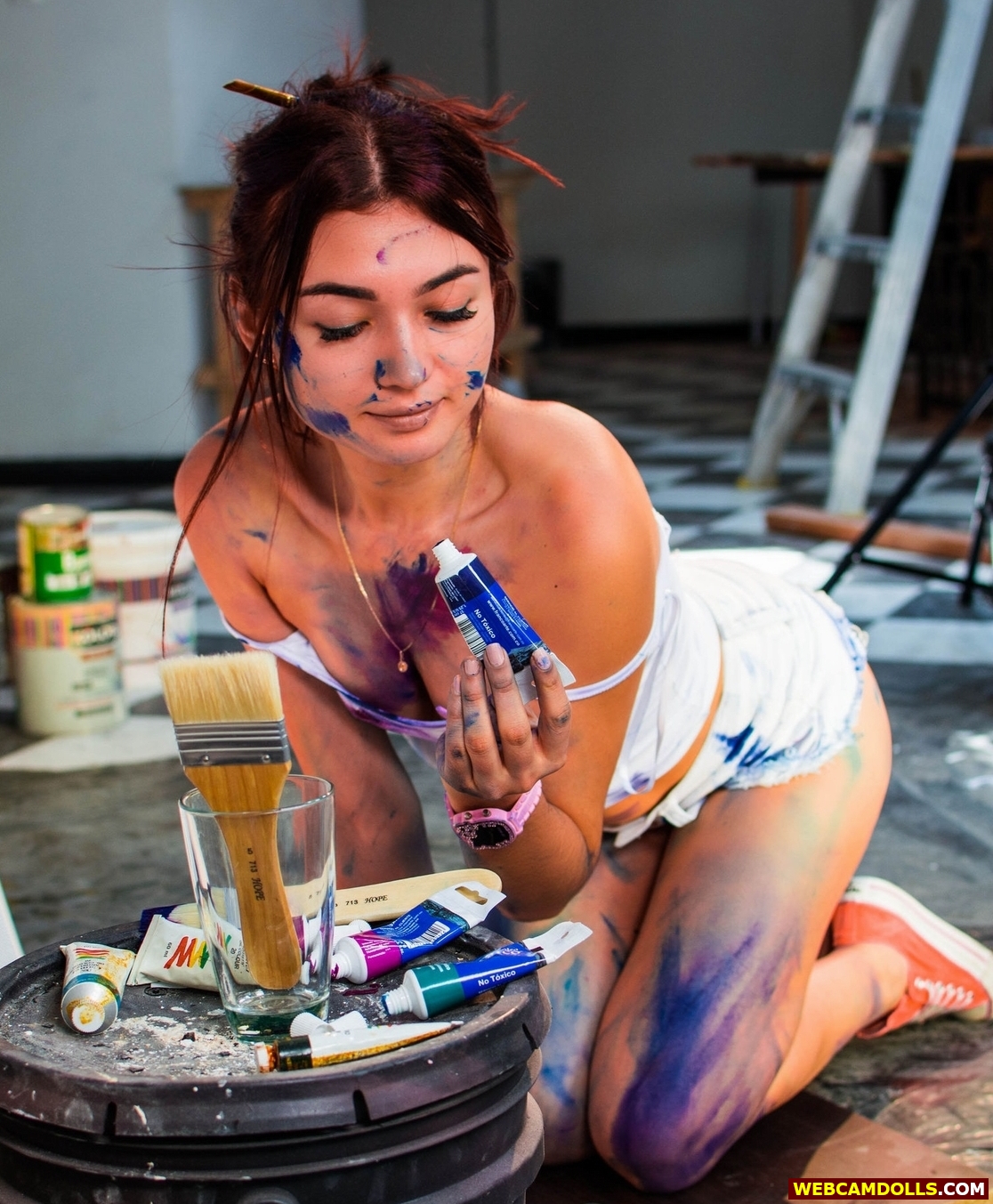 Messy Girl covered with Paint in Orange Sneakers and White Shorts on Webcamdolls