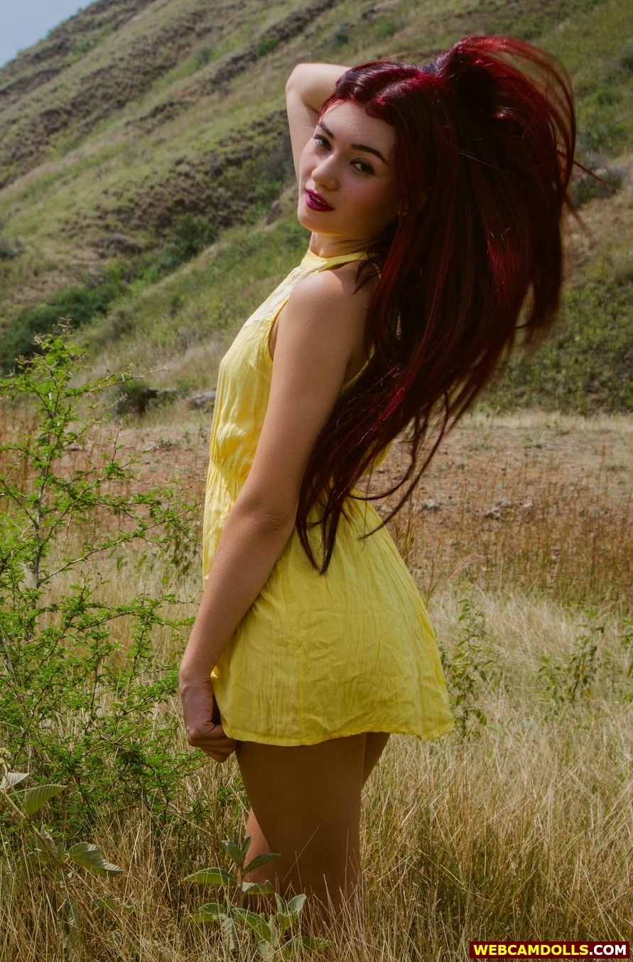 Redhead Girl walking in Meadow in Yellow Short Dress on Webcamdolls